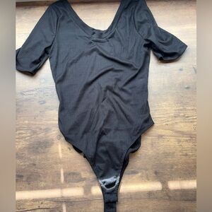 NWOT Woman’s Black Ribbed Bodysuit